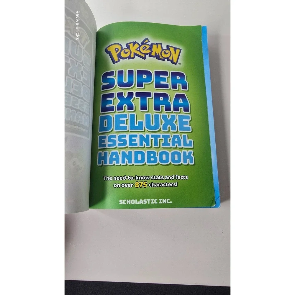 Pokémon super Extra Deluxe Essential Handbook isbn 9781338714128 scholastic fact